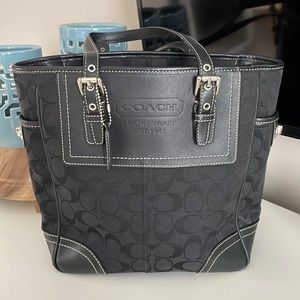 Very clean black Coach purse